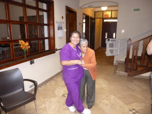 Another caregiver welcomes a returning resident